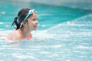 child in swimming pool