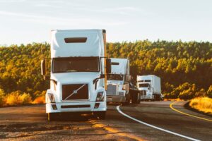 convoy of trucks on highway